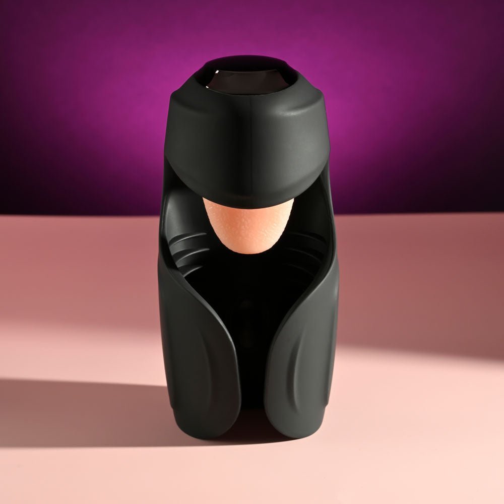 Front view of the Zero Tolerance Lick the Tip vibrating male masturbator displayed on a purple and pink background | Flirty Bay adult store Perth